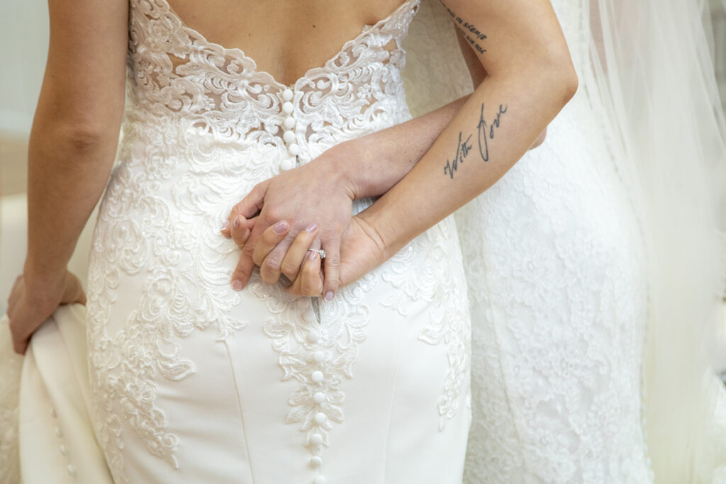 brides on wedding day at Windows on the Water at Frogbridge. LGBTQ wedding