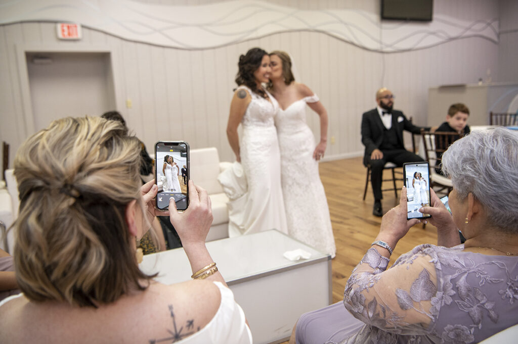 brides on wedding day at Windows on the Water at Frogbridge. LGBTQ wedding