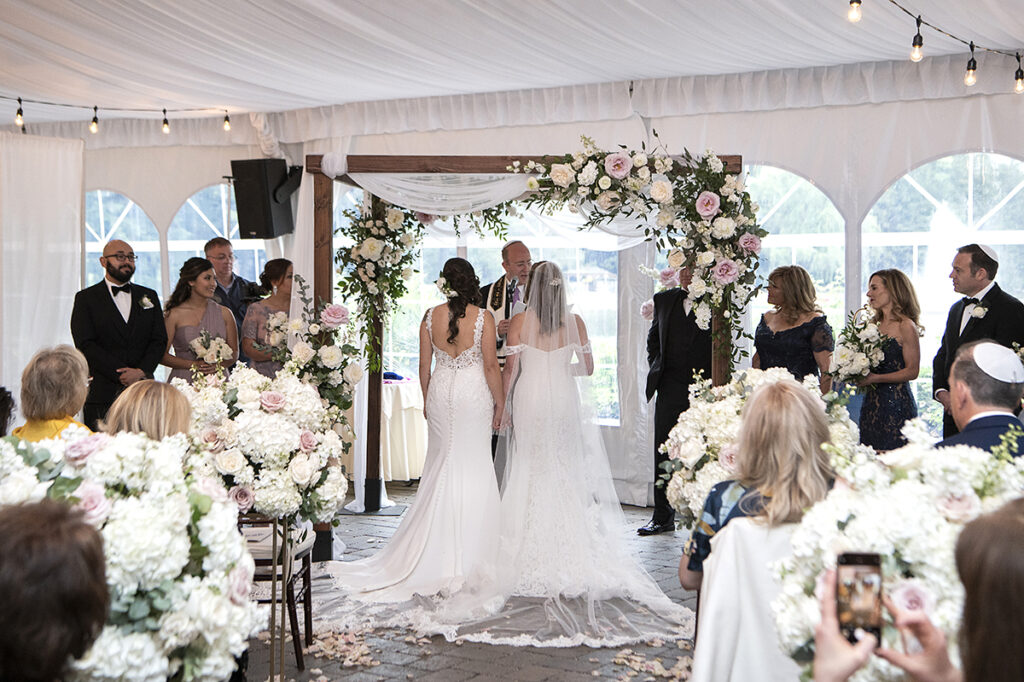 Jewish wedding ceremony at Windows on the Water at Frogbridge. LGBTQ wedding