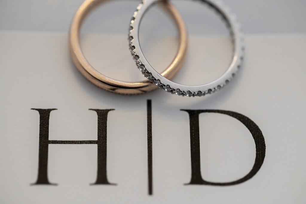 wedding rings on wedding day at Windows on the Water at Frogbridge. LGBTQ wedding