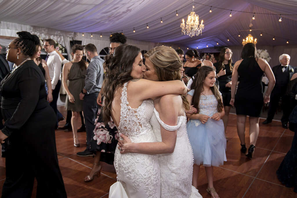 dancing at wedding reception on wedding day at Windows on the Water at Frogbridge. LGBTQ wedding