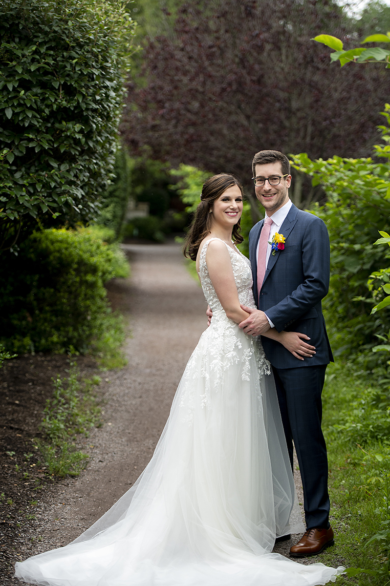 bride and groom on wedding day at River House at Odette’s in New Hope.