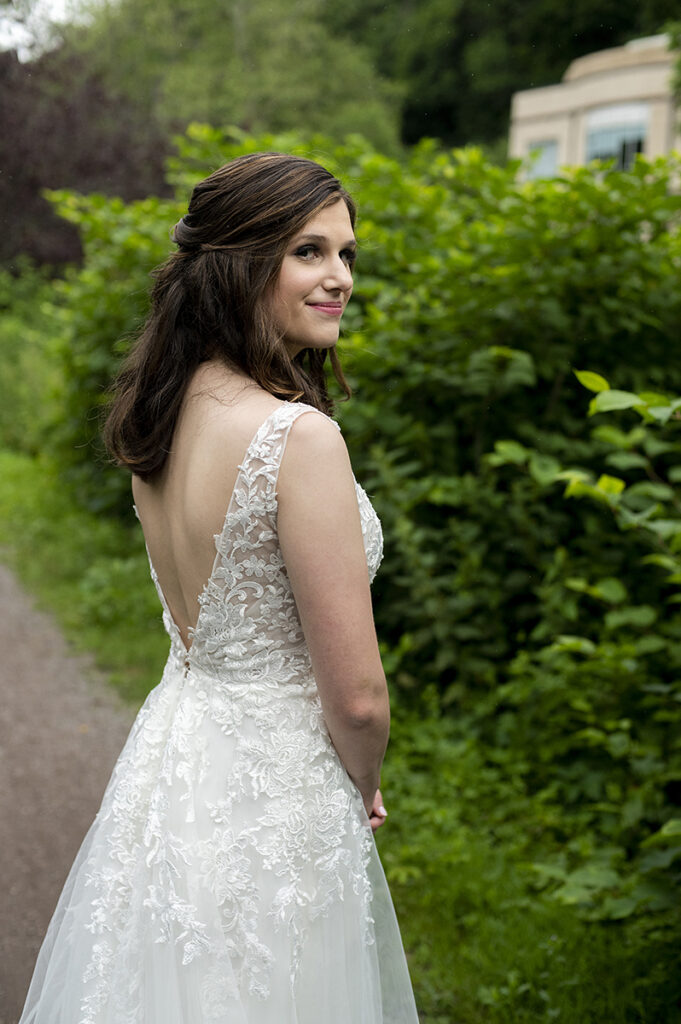 bride on wedding day at River House at Odette’s in New Hope.