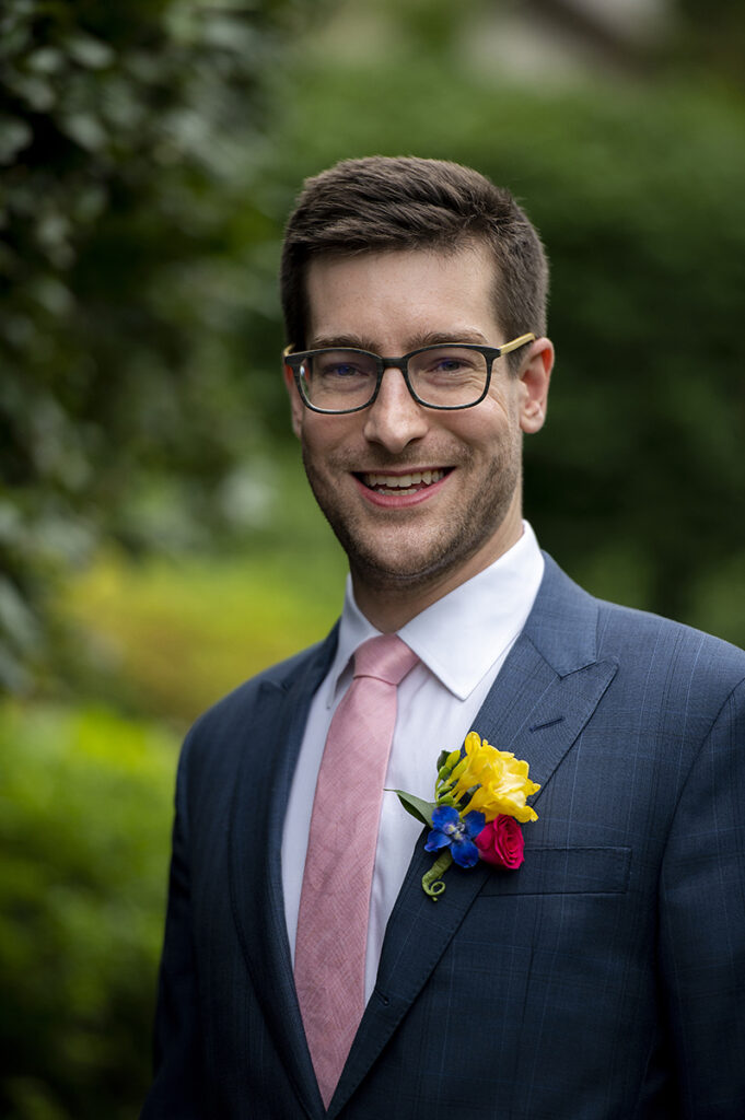 groom on wedding day at River House at Odette’s in New Hope.