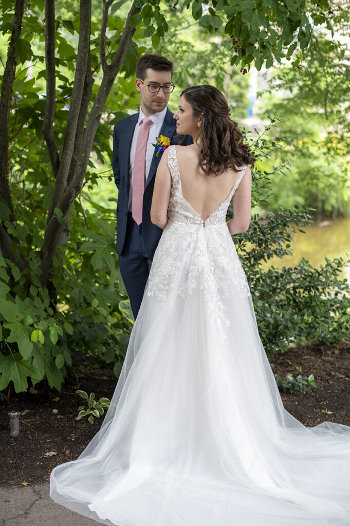 bride and groom on wedding day at River House at Odette’s in New Hope.