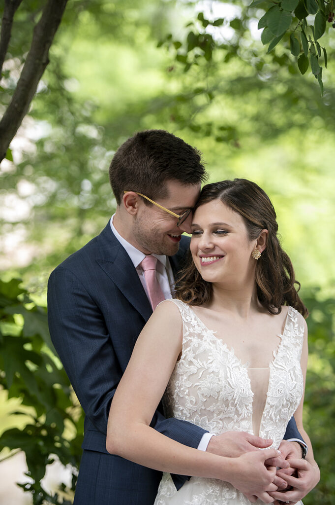 bride and groom on wedding day at River House at Odette’s in New Hope.