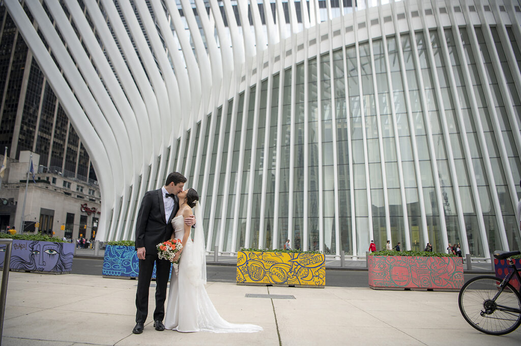 bride and groom at the oculus on their wedding day