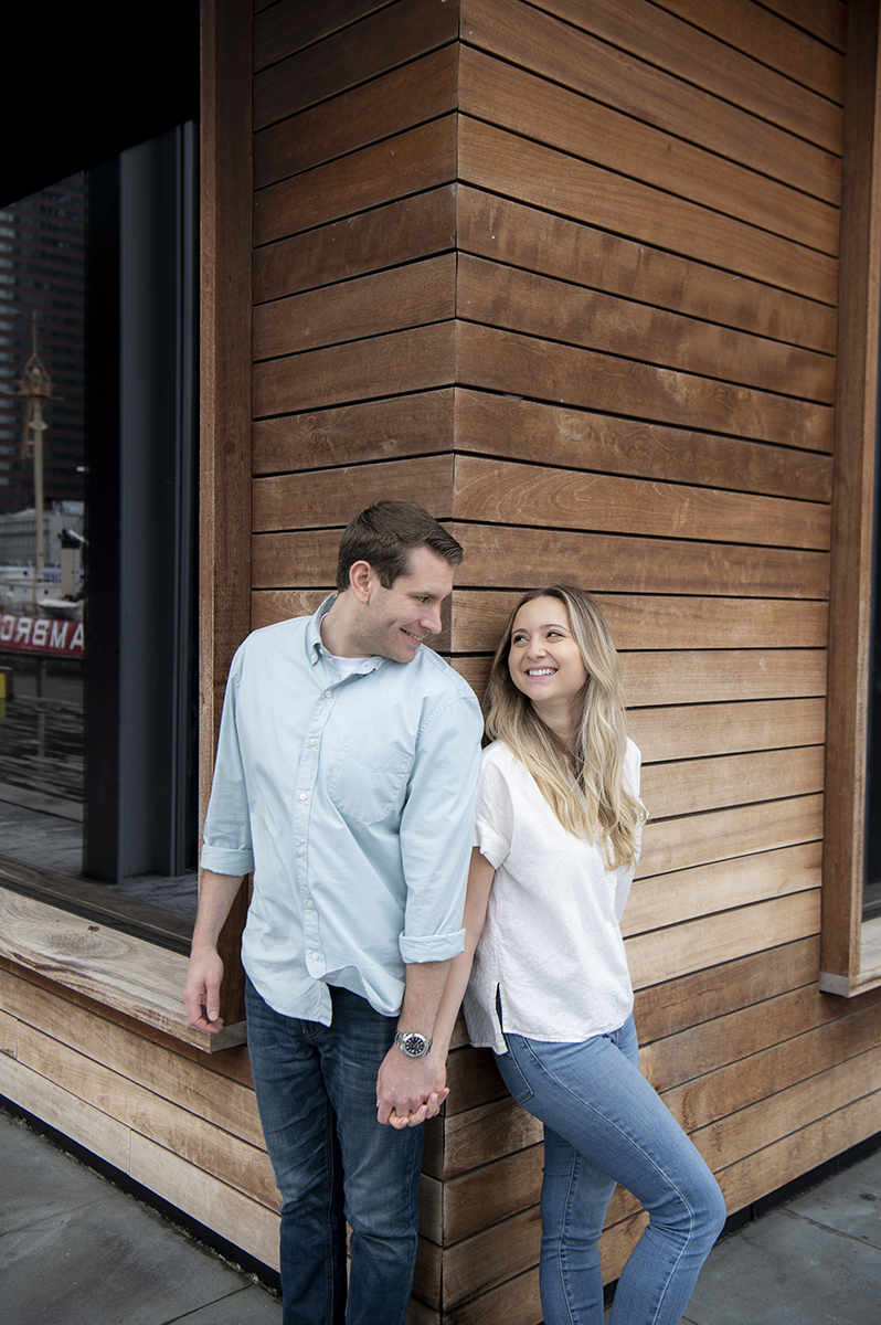 couple at South Street Seaport for their engagement session in NYC