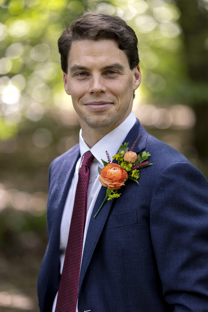 groom on their wedding day at Belle Voir Manor at Pen Ryn Estate