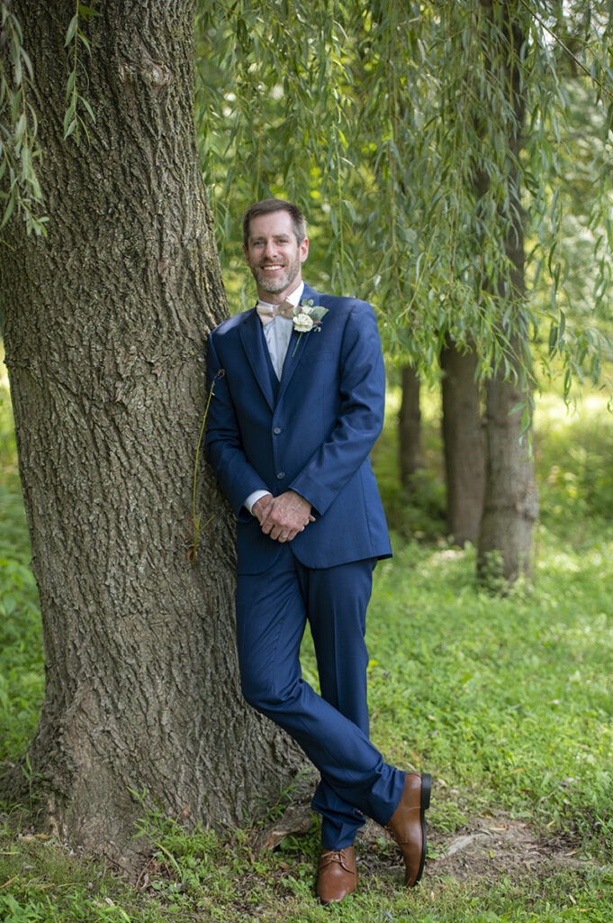 groom on their wedding day at Hotel du Village wedding