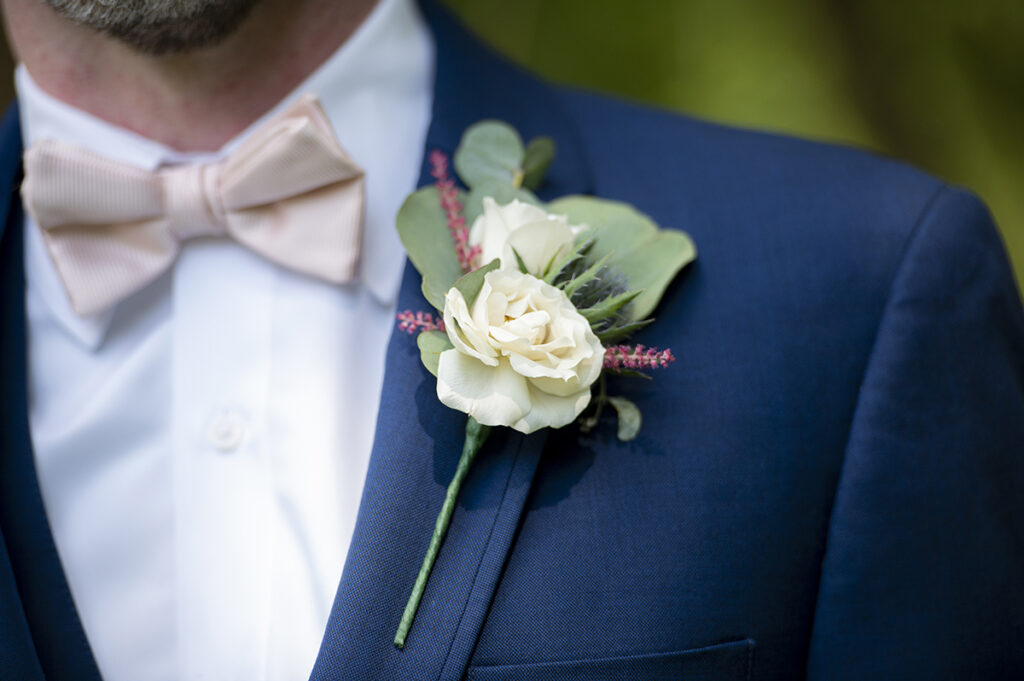 groom on their wedding day at Hotel du Village wedding