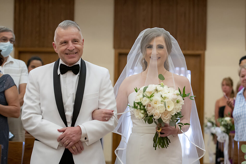 bride and her father walking down the aisle. NYC wedding