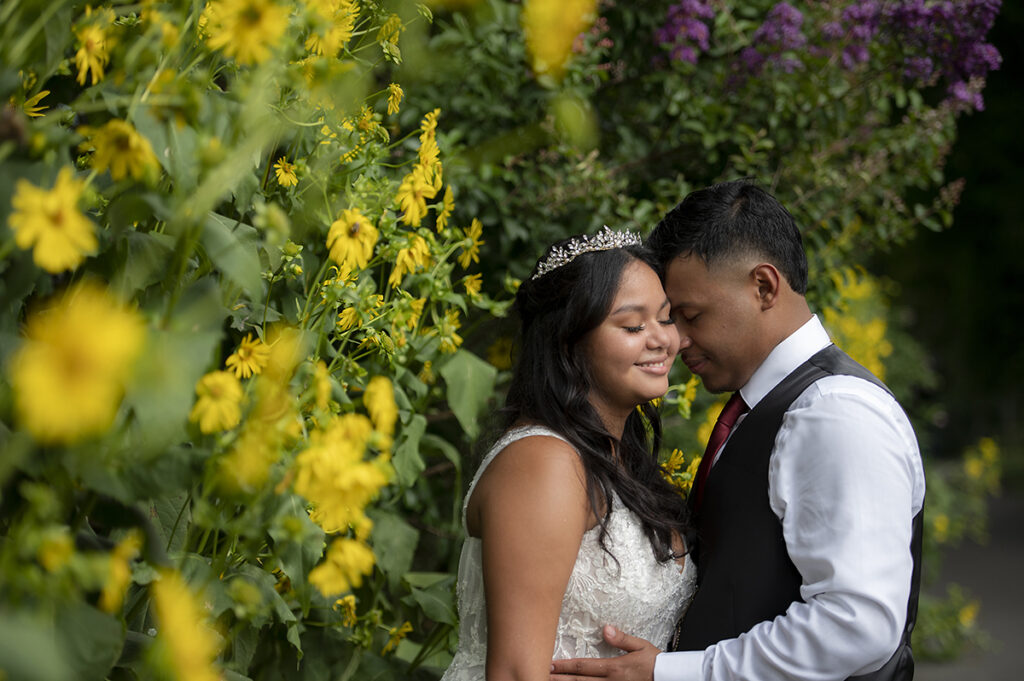 bride and groom on their wedding day at Queens Botanical Garden