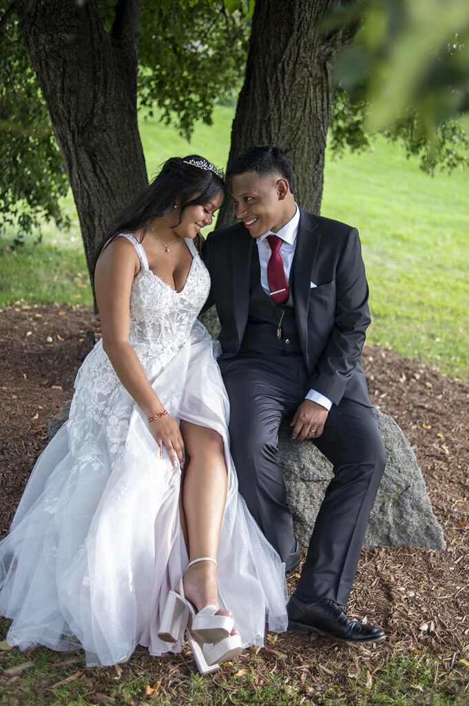 bride and groom pose for portraits after their intimate Queens Botanical Garden wedding