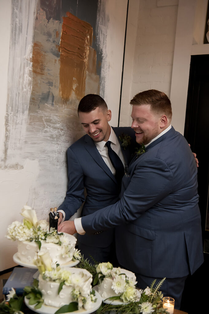 Intimate Hoboken wedding celebration at Olivia's. Cake Cutting