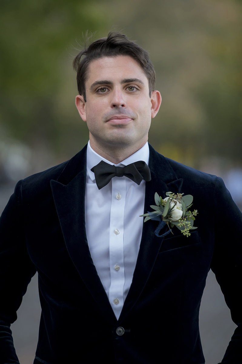 groom in Hoboken on their wedding day