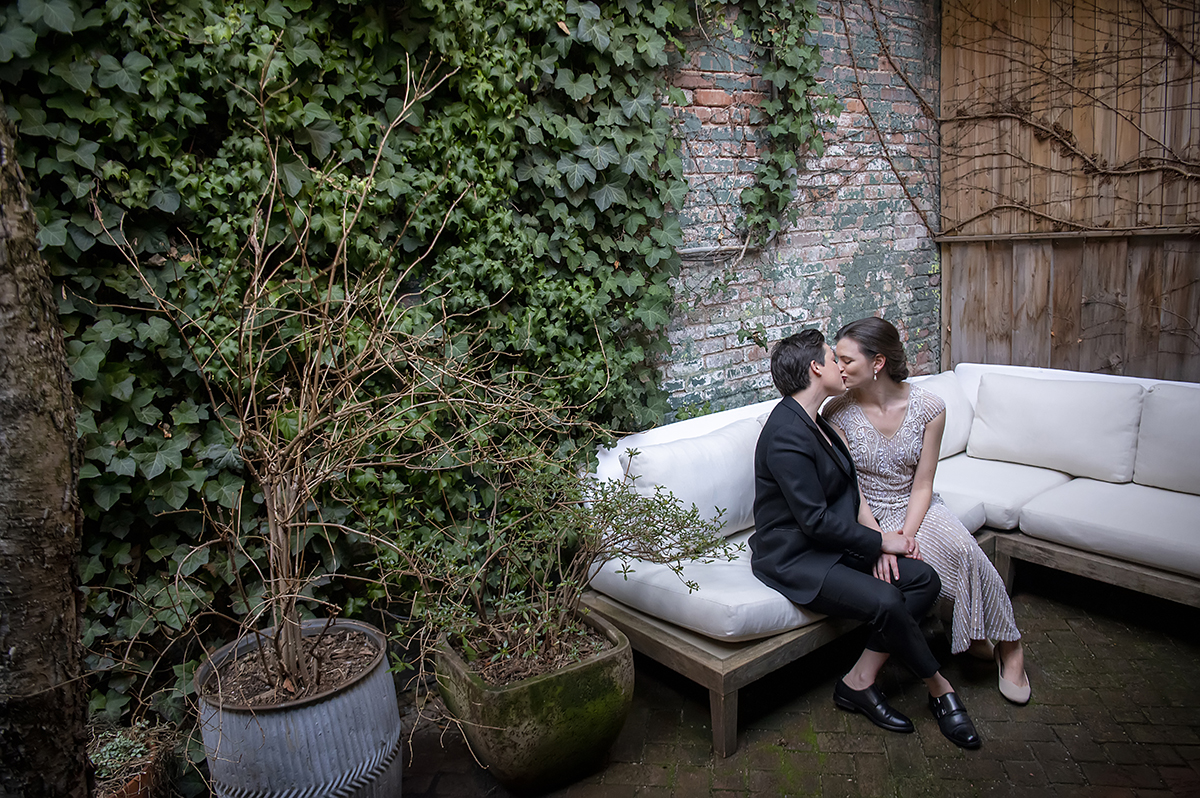 2 brides wedding portraits before their West Village intimate backyard wedding in NYC. LGBTQ wedding