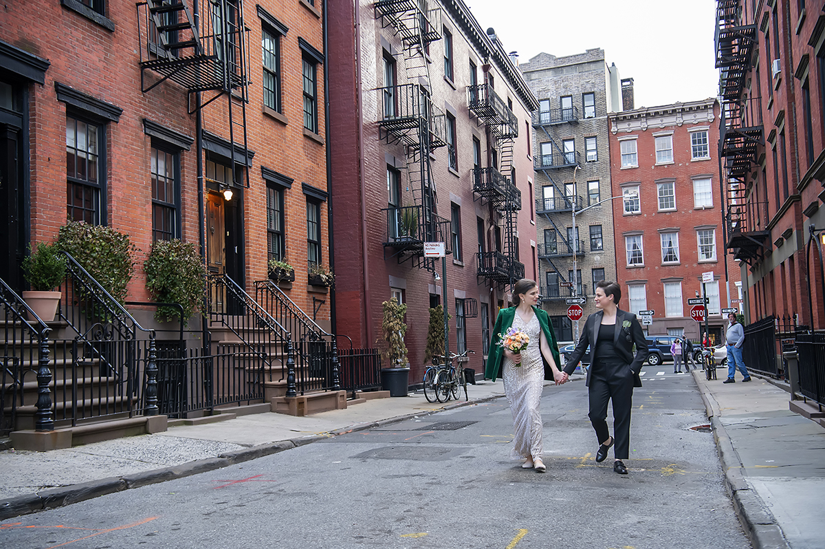 2 brides wedding portraits after their West Village intimate backyard wedding in NYC. LGBTQ wedding
