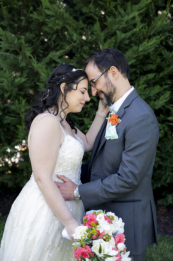 bride and groom on wedding day at Conservatory at The Madison Hotel Wedding in Morristown, NJ