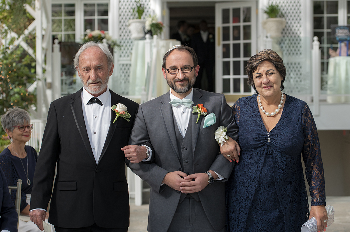 groom walking down the aisle at ceremony at Conservatory at The Madison Hotel Wedding in Morristown, NJ