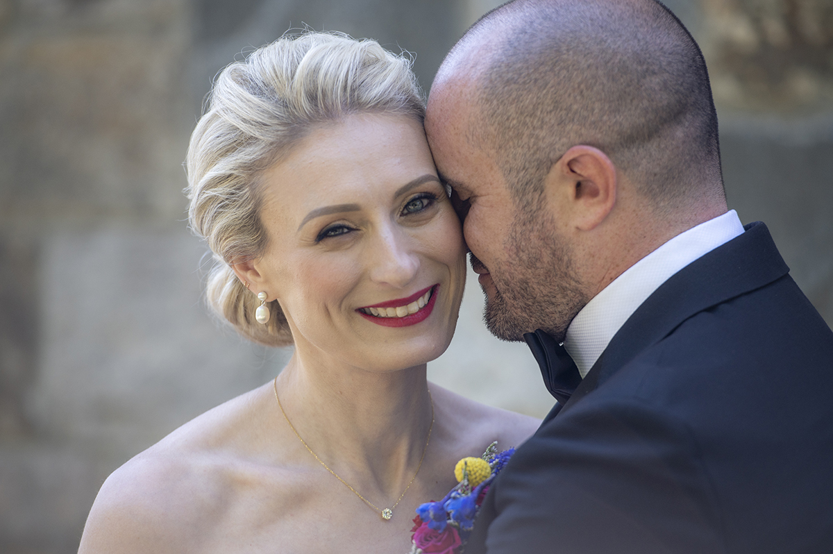 Bride and groom during their summer wedding at Temple Emanu-El in Closter