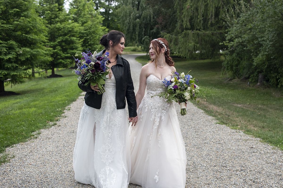 brides posing for portraits before their Crossed Keys Estate Wedding