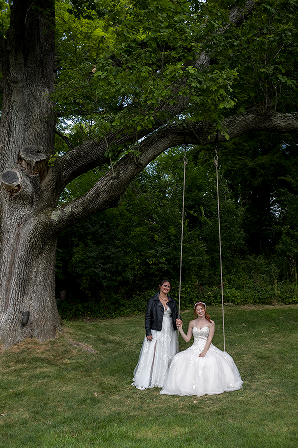 brides posing for portraits before their Crossed Keys Estate Wedding