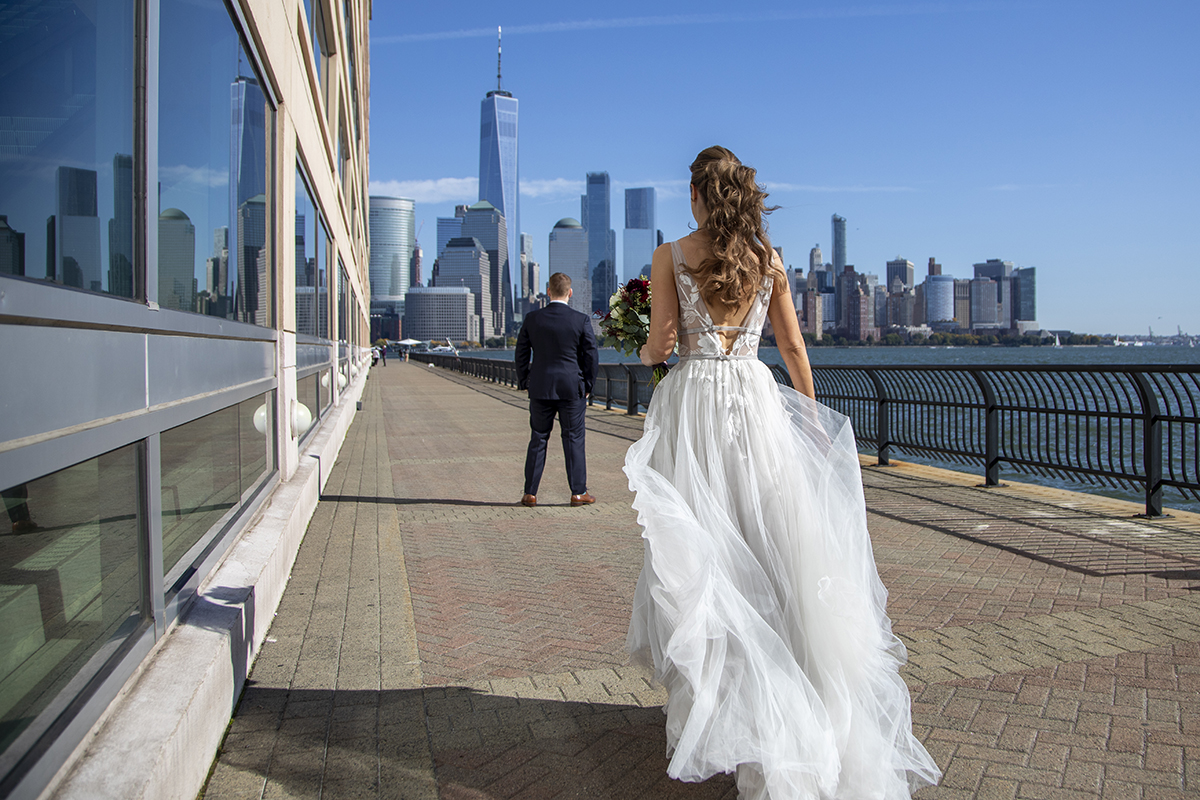 bride and groom first look on fall wedding at Liberty House in Jersey City