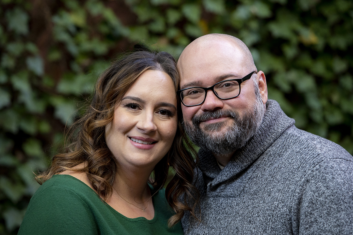 couple posing on Elfreths Alley in Philadelphia for their Old City Philly engagement session