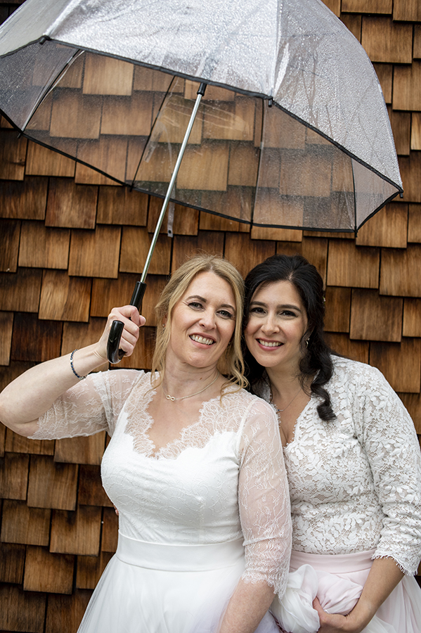 Two brides pose for portraits at Reeves-Reed Arboretum Wedding | LGBTQ wedding photographer