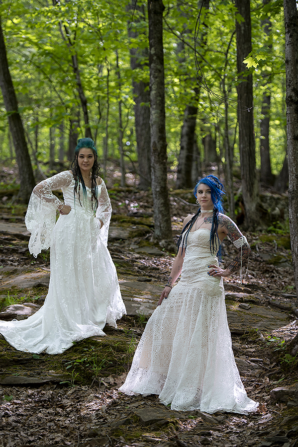 brides in the forest on their wedding day at Riedlbauer’s Resort in the Catskills. LGBTQ wedding