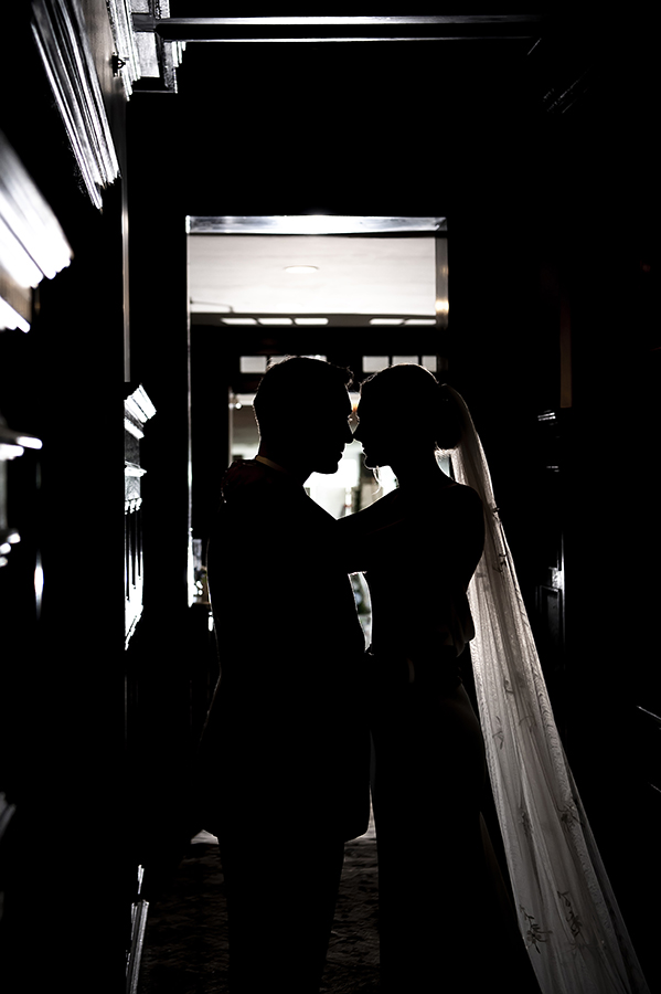 bride and groom pose for portraits on their wedding day at Orienta Beach Club