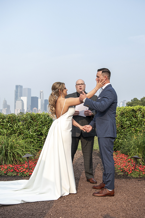 wedding ceremony with NYC skyline at Liberty House in Jersey City