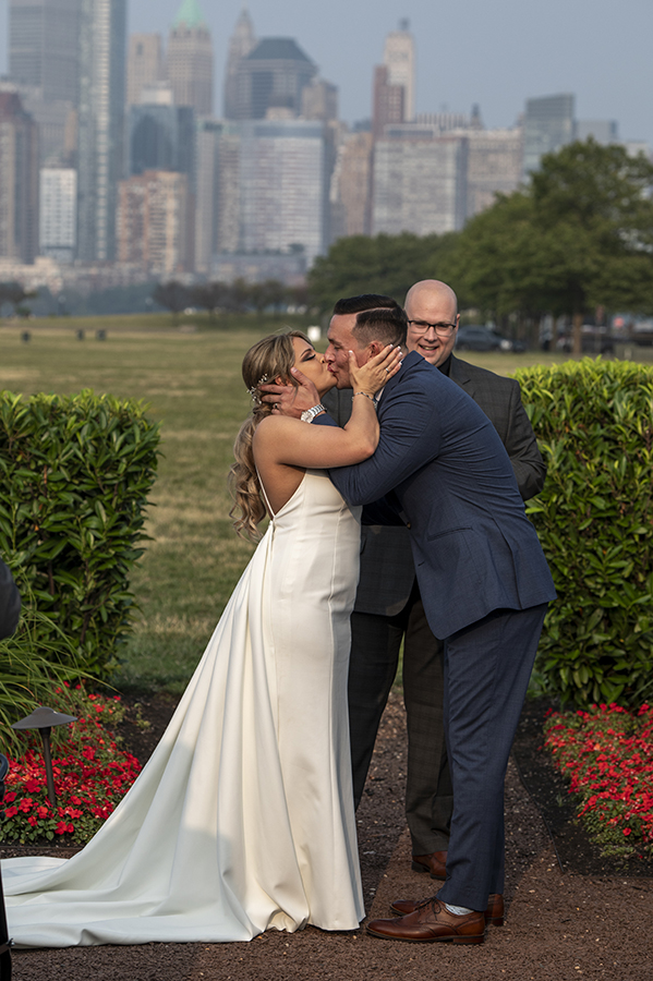 wedding ceremony with NYC skyline at Liberty House in Jersey City