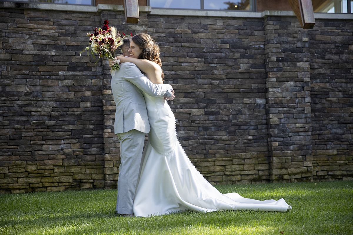 bride and groom on their wedding day at Stone House at Stirling Ridge