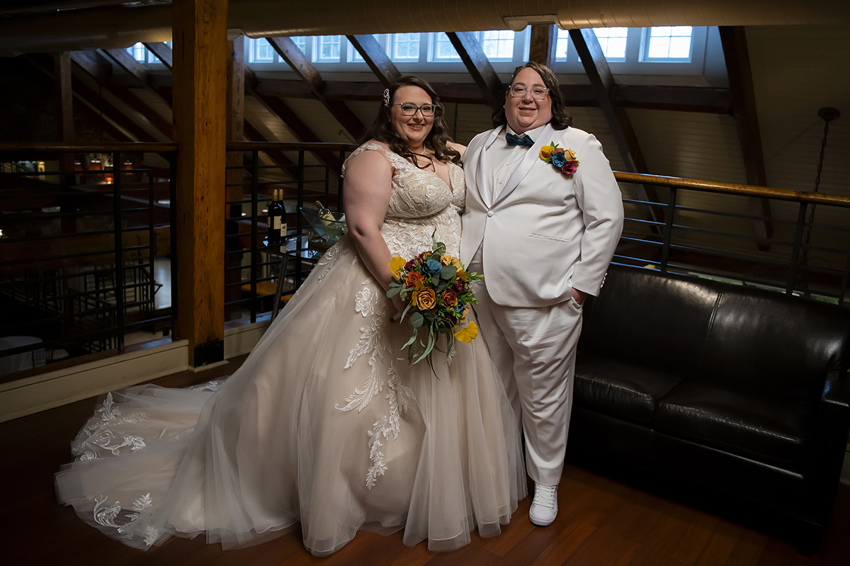 brides on wedding day at Stone House at Stirling Ridge. LGBTQ wedding