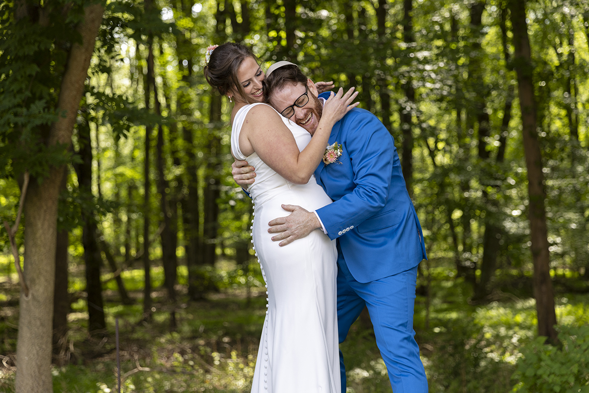 bride and groom at Temple Emanu-El of Closter on their wedding day