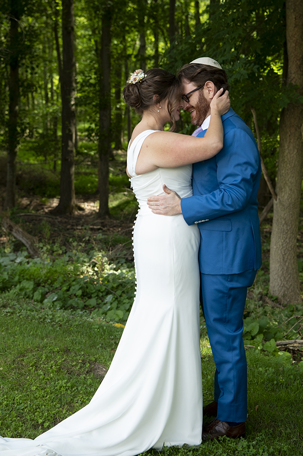 bride and groom at Temple Emanu-El of Closter on their wedding day