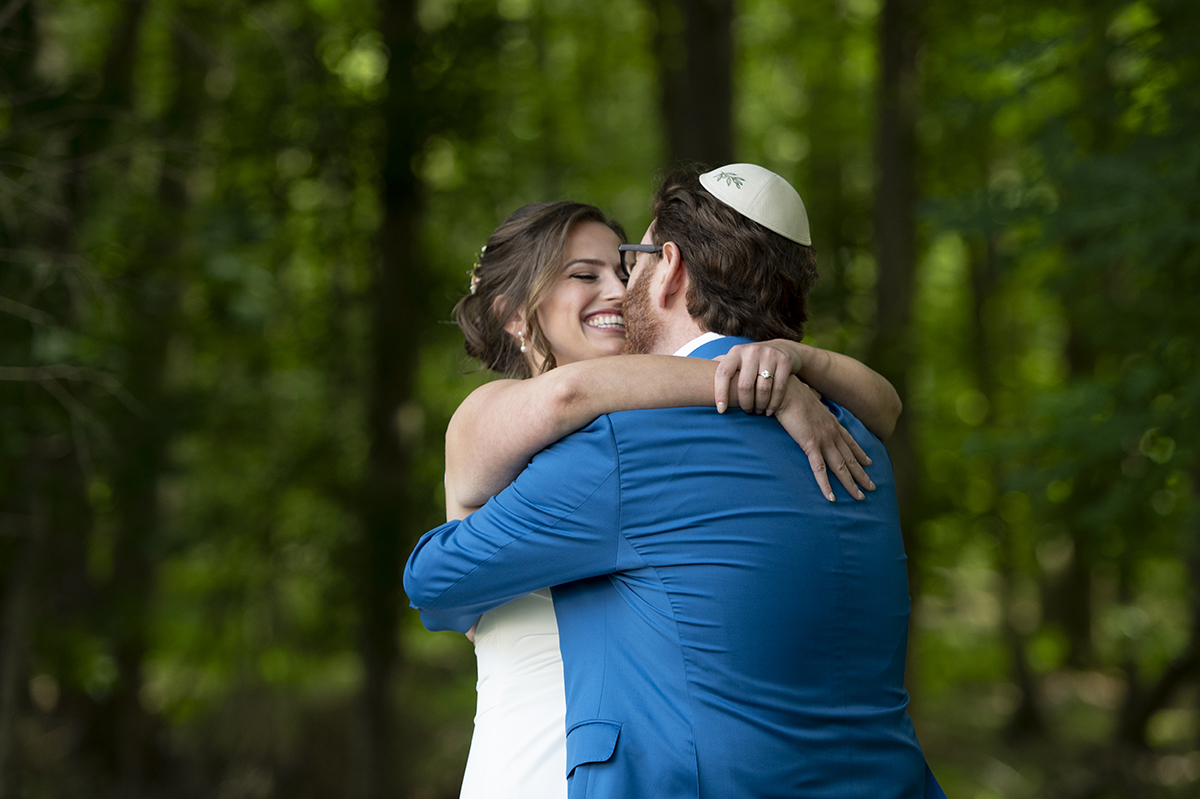 bride and groom at Temple Emanu-El of Closter on their wedding day