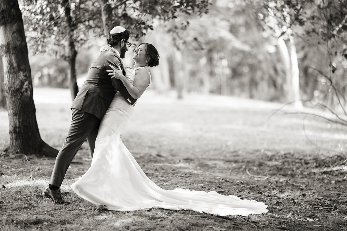 bride and groom at Temple Emanu-El of Closter on their wedding day