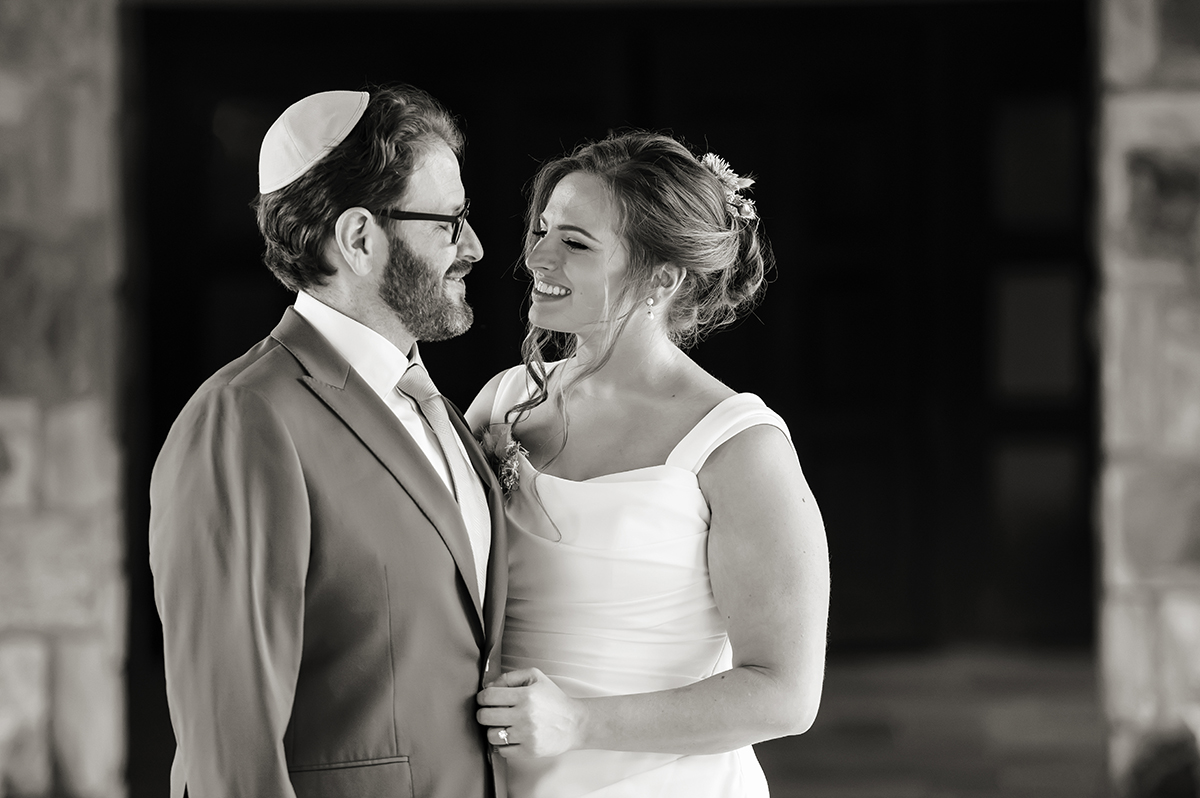 bride and groom at Temple Emanu-El of Closter on their wedding day
