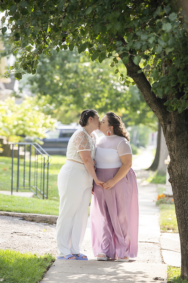 2 brides kissing on their wedding day in New Jersey