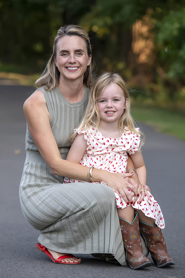 mom and daughter posing for fall family photos in Arlington, VA