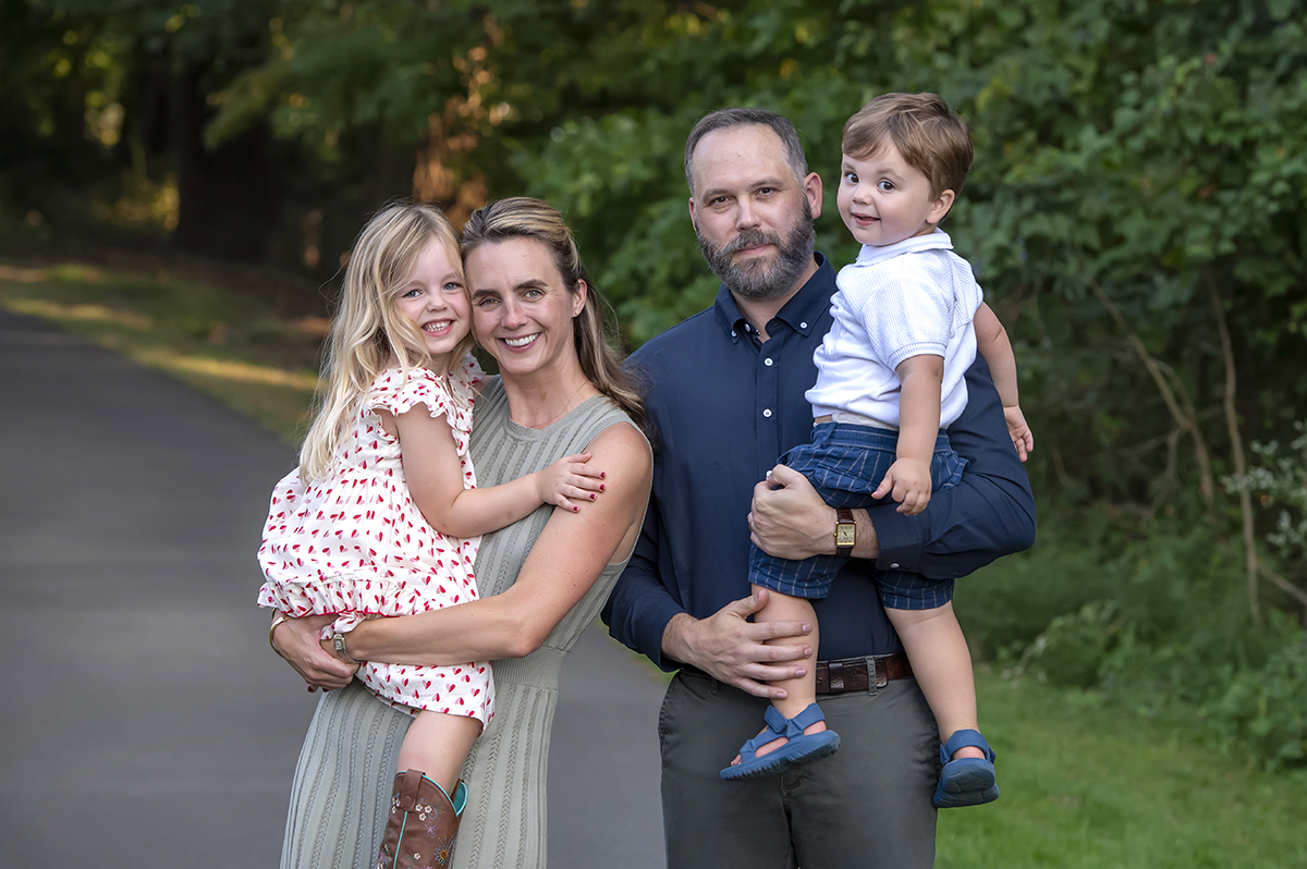 family posing for fall family photos in Arlington, VA
