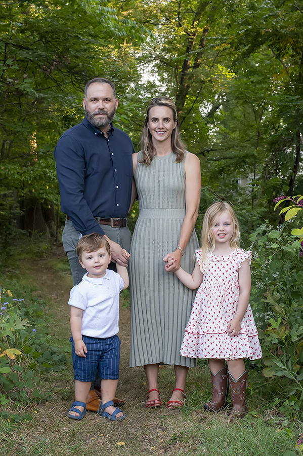 family posing for fall family photos in Arlington, VA