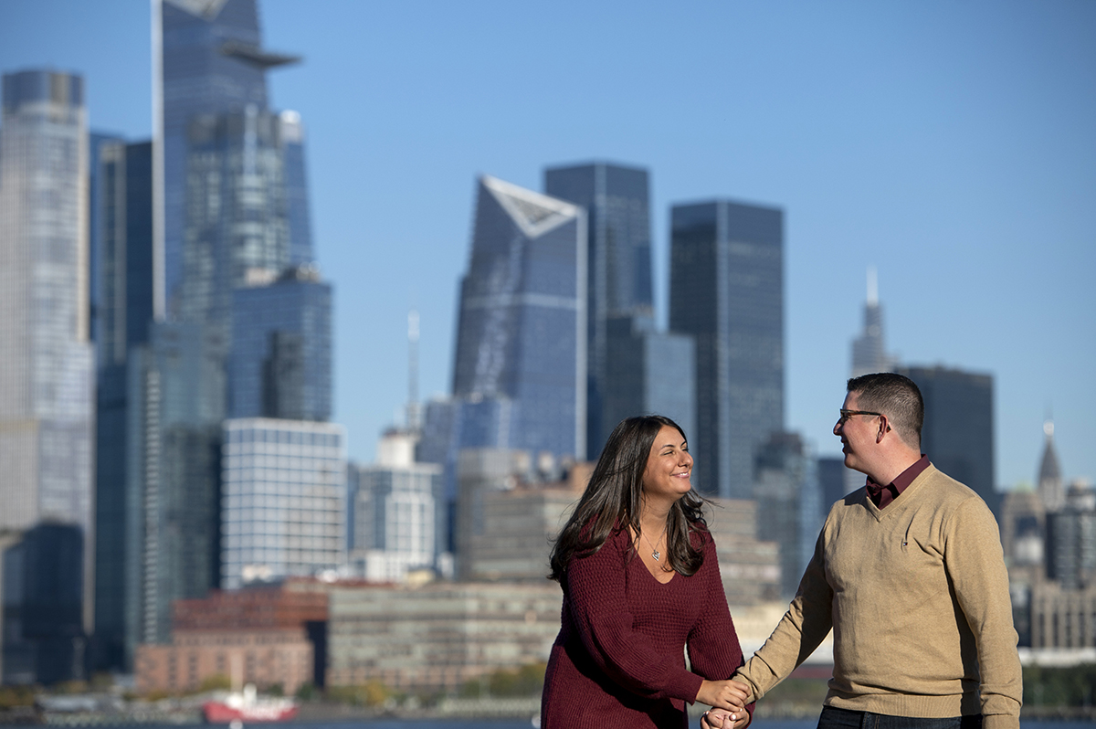 Hoboken engaged couple with NYC skyline