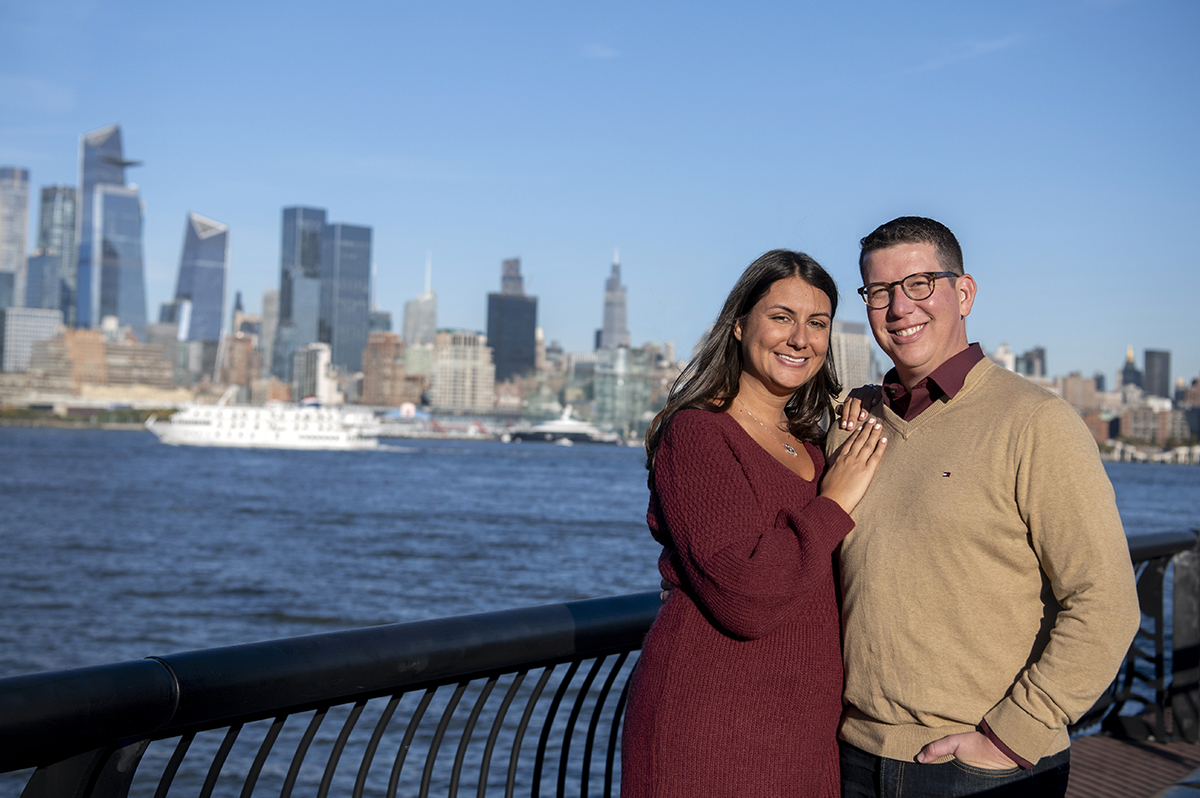Hoboken engaged couple with NYC skyline