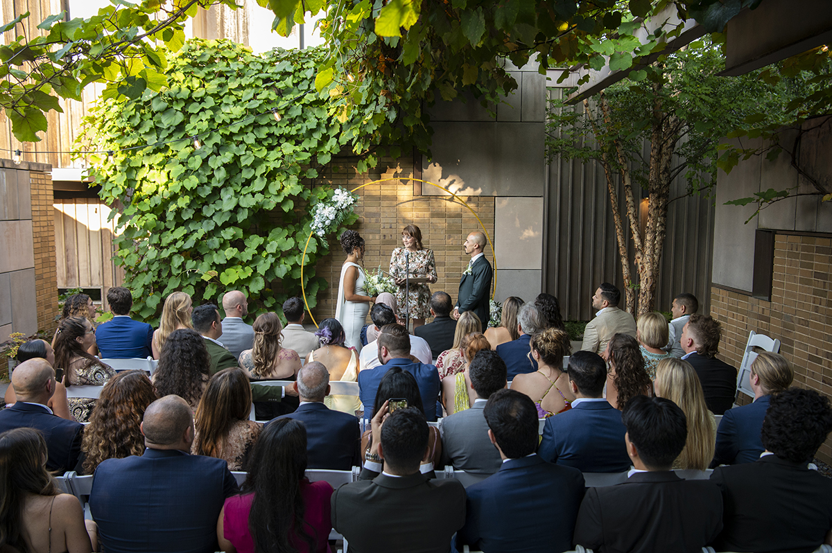 newlywed couple during wedding ceremony at Carroll Hall in Brooklyn