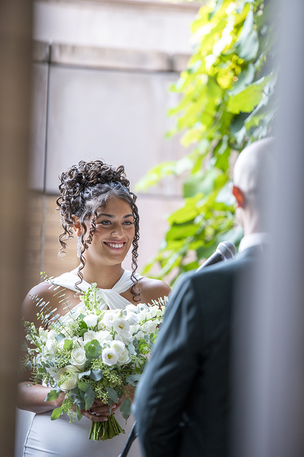 newlywed couple during wedding ceremony at Carroll Hall in Brooklyn
