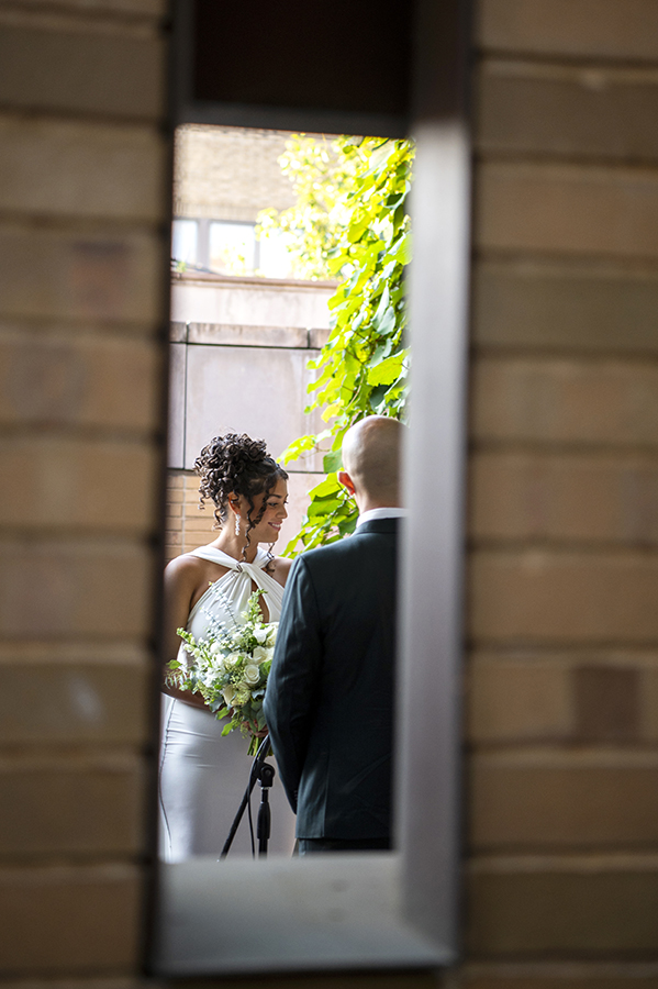 newlywed couple during wedding ceremony at Carroll Hall in Brooklyn